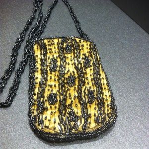 GOLD MINI BAG WITH BLACK BEADS